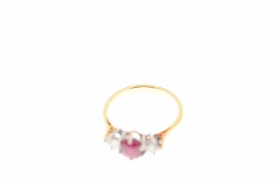 Lot 7 - Ruby and diamond three stone ring