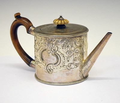 Lot 104 - George III silver teapot with later embossed rococo decoration