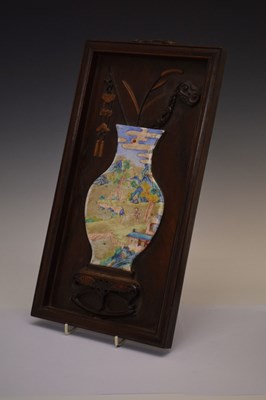 Lot 241 - Chinese hardwood and painted enamel relief panel
