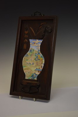 Lot 241 - Chinese hardwood and painted enamel relief panel