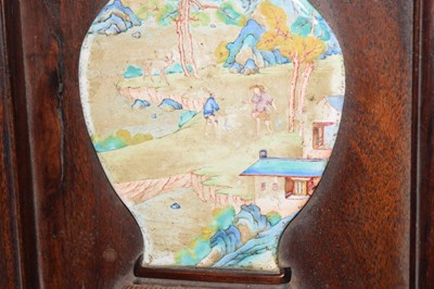 Lot 241 - Chinese hardwood and painted enamel relief panel