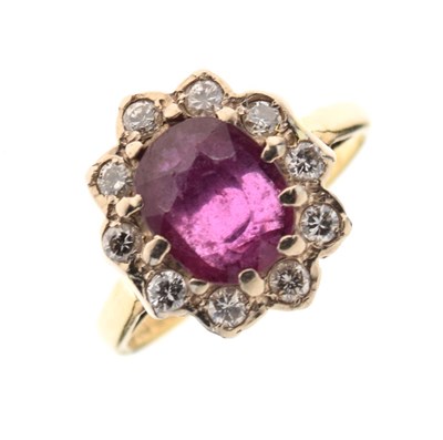 Lot 22 - 18ct gold ruby and diamond cluster ring