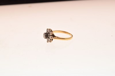 Lot 10 - Nine stone diamond cluster ring