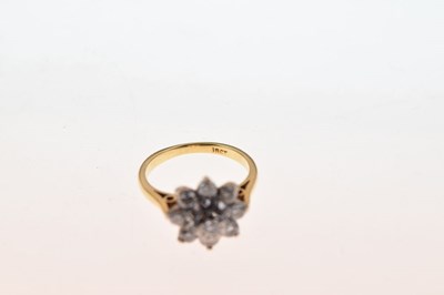 Lot 10 - Nine stone diamond cluster ring