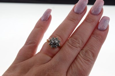 Lot 10 - Nine stone diamond cluster ring