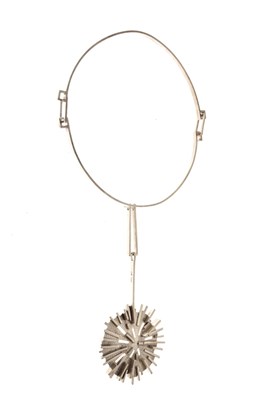 Lot 57 - Modernist silver pendant on a neck ring