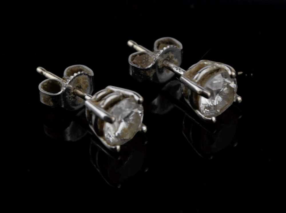 Lot 35 - Pair of single stone diamond 18ct white gold earstuds