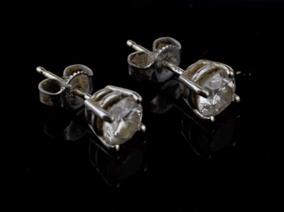 Lot 35 - Pair of single stone diamond 18ct white gold earstuds