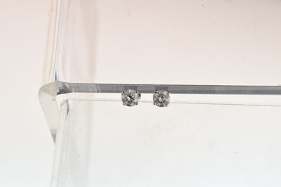 Lot 35 - Pair of single stone diamond 18ct white gold earstuds
