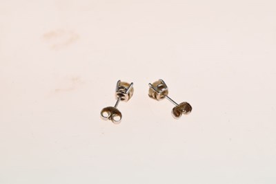 Lot 35 - Pair of single stone diamond 18ct white gold earstuds