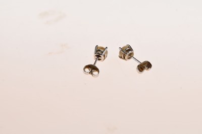 Lot 35 - Pair of single stone diamond 18ct white gold earstuds