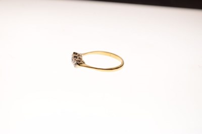 Lot 4 - '18c' yellow metal three-stone diamond ring