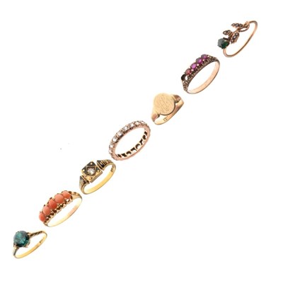 Lot 28 - Six assorted yellow metal gem-set rings and a signet ring