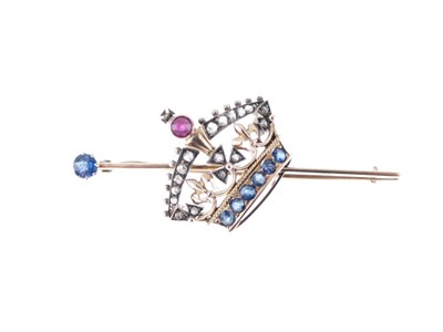 Lot 33 - Diamond, ruby and sapphire set coronet bar brooch