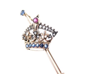 Lot 33 - Diamond, ruby and sapphire set coronet bar brooch