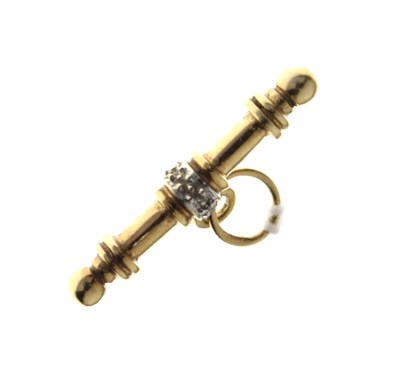 Lot 64 - 9ct gold diamond set T-bar