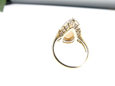 Lot 27 - Opal and diamond cluster dress ring