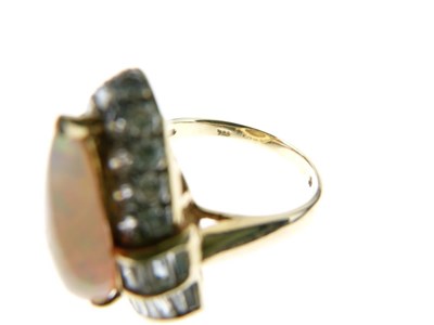 Lot 27 - Opal and diamond cluster dress ring