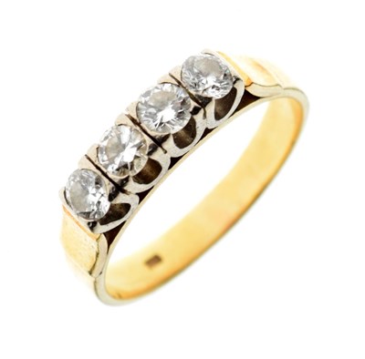 Lot 6 - Yellow metal, four-stone ring