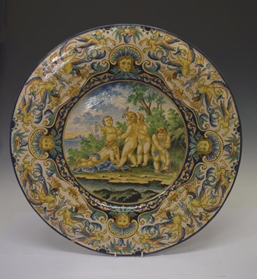 Lot 489 - Large Italian maiolica charger, amorini