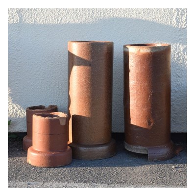 Lot 810 - Ceramic drain pipes and composite stone planter