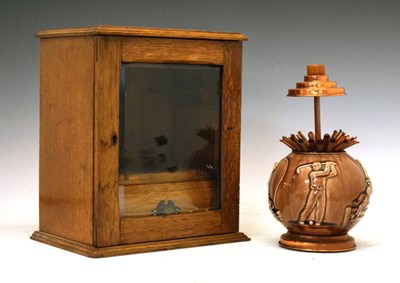 Lot 739 - Pottery cigarette dispenser and smokers cabinet (2)