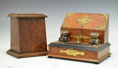 Lot 699 - Early 20th Century oak desk stand with brass mounts , etc.