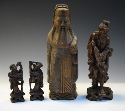 Lot 266 - Group of wooden Oriental figures