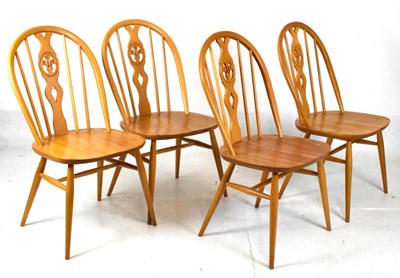 Lot 597 - Set of four Ercol light Windsor style chairs