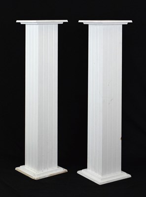 Lot 704 - Pair of white finish pedestals