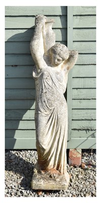 Lot 813 - Composite stone maiden carrying urn