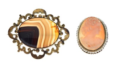 Lot 26 - Cameo brooch with seed pearl surround, and an agate brooch (2)