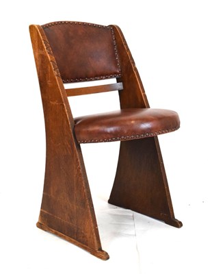Lot 685 - Ernest Gomme of High Wycombe - Tan leatherette studded chair