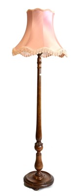 Lot 686 - Carved walnut standard lamp