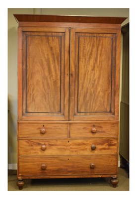 Lot 606 - Mahogany linen press
