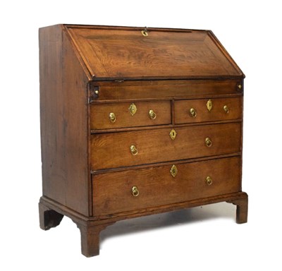 Lot 696 - George II oak bureau