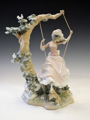 Lot 486 - Lladro porcelain figure - Woman on a swing