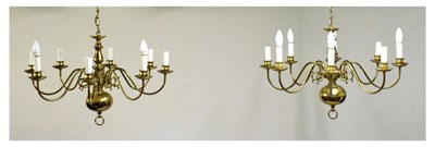 Lot 715 - Pair of eight branch brass light fittings