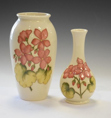 Lot 383 - Moorcroft  - Two pink floral cream ground vases