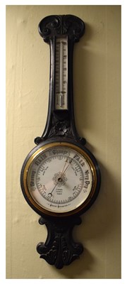 Lot 558 - Wheel barometer