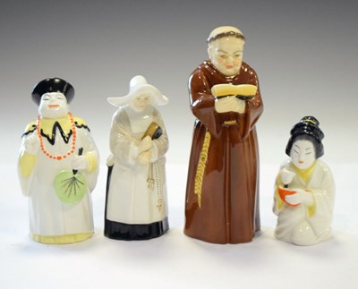 Lot 387 - Four Royal Worcester candle snuffers